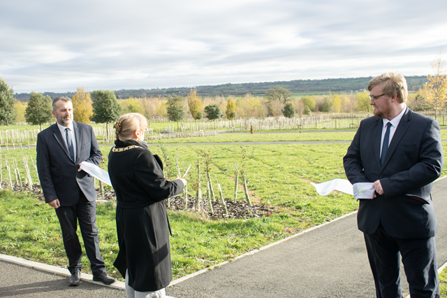 (centre) The Mayor of Rugby, Cllr Barbara Brown, cut the ribbon at the official opening of Rainsbrook Cemetery, joined by Rainsbrook's Adrian Tierney (left) and Edward Benyon (right).