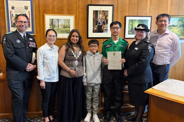 Corporal Joshua Tan and family visited (centre) Cllr Nooria Sayani in the Mayor's parlour at the Town Hall with (left) Nicholas Old, St John Ambulance network lead for north and east Warwickshire, and Ginny Taylor-Fallows, St John Ambulance cadet group lead for Rugby.
